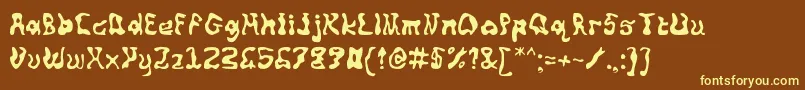 Squiggly-fontti – keltaiset fontit ruskealla taustalla