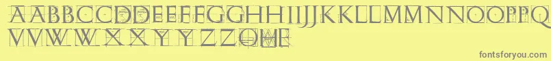 Romangridcaps Font – Gray Fonts on Yellow Background