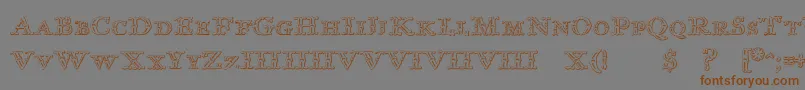 フォントImprentaRoyalNonpareilBeveled – 茶色の文字が灰色の背景にあります。