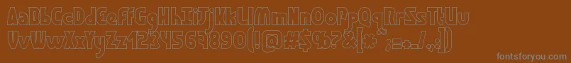 Шрифт GraphismeHollow – серые шрифты на коричневом фоне