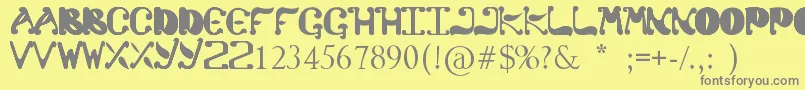 フォントColato – 黄色の背景に灰色の文字