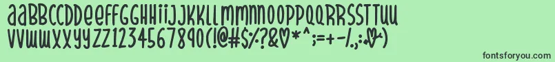 SparklyHearts Font – Black Fonts on Green Background