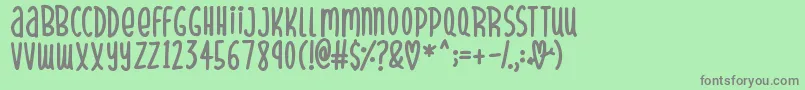 SparklyHearts Font – Gray Fonts on Green Background