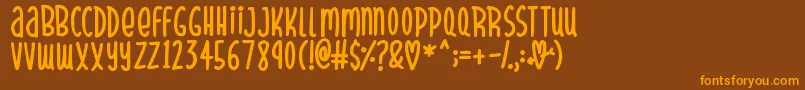 SparklyHearts Font – Orange Fonts on Brown Background