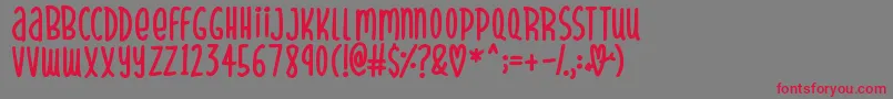 SparklyHearts-Schriftart – Rote Schriften auf grauem Hintergrund