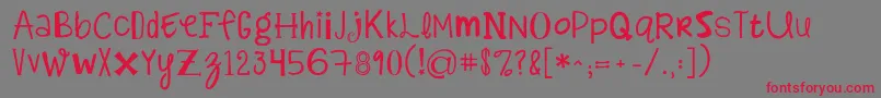 Kgalphabetregurgitation-Schriftart – Rote Schriften auf grauem Hintergrund