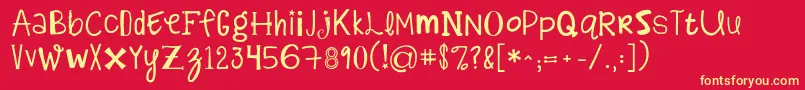 Kgalphabetregurgitation-Schriftart – Gelbe Schriften auf rotem Hintergrund