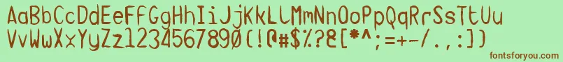 TargaMsHand Font – Brown Fonts on Green Background