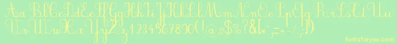 フォントPlumnde – 黄色の文字が緑の背景にあります