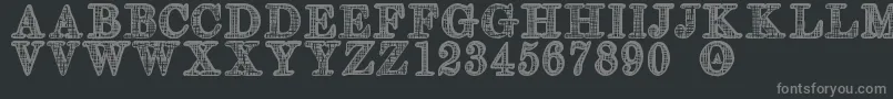 フォントOlderSt – 黒い背景に灰色の文字