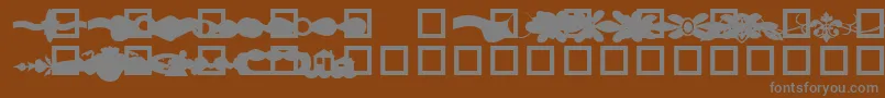 Шрифт GcDesignLineDingbat – серые шрифты на коричневом фоне