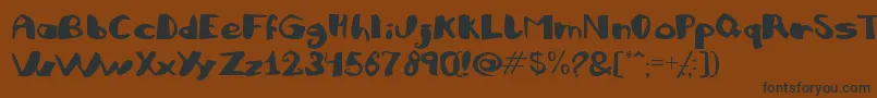 Julifb Font – Black Fonts on Brown Background