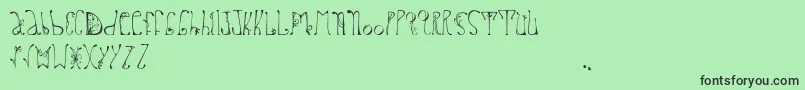 フォントDelfinah – 緑の背景に黒い文字