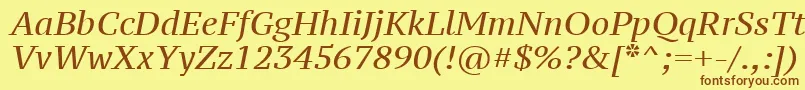 フォントPtz56fW – 茶色の文字が黄色の背景にあります。