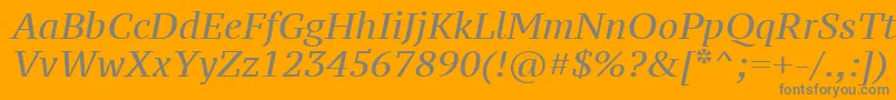 Ptz56fW-fontti – harmaat kirjasimet oranssilla taustalla