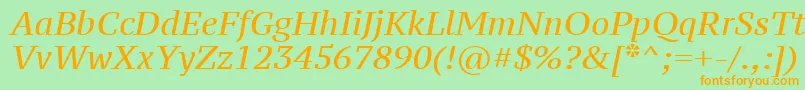 フォントPtz56fW – オレンジの文字が緑の背景にあります。