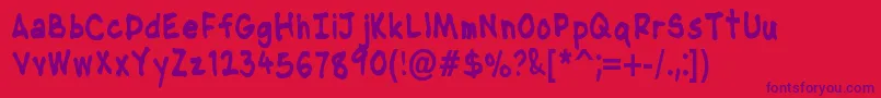 Шрифт NipcensHandwritingCondbd – фиолетовые шрифты на красном фоне