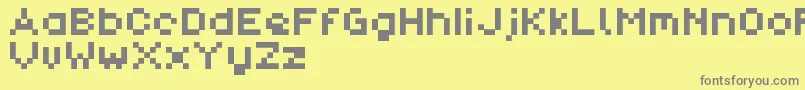 Fonte PixlDemo – fontes cinzas em um fundo amarelo