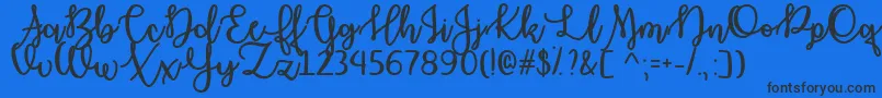 OctoberMoonOtf Font – Black Fonts on Blue Background