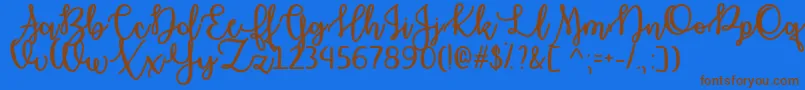 OctoberMoonOtf Font – Brown Fonts on Blue Background