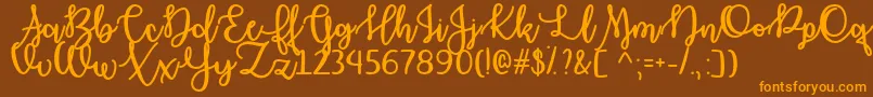 OctoberMoonOtf-Schriftart – Orangefarbene Schriften auf braunem Hintergrund