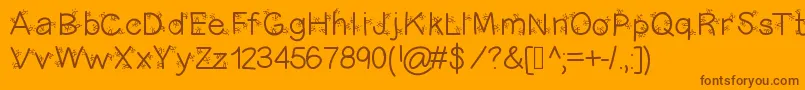 Christmasligtness-Schriftart – Braune Schriften auf orangefarbenem Hintergrund
