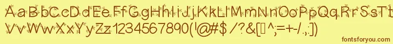 Christmasligtness Font – Brown Fonts on Yellow Background