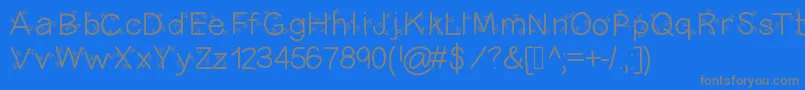 Christmasligtness Font – Gray Fonts on Blue Background