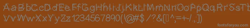 Christmasligtness Font – Gray Fonts on Brown Background