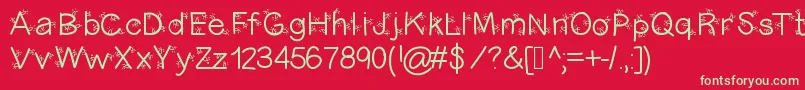 Christmasligtness-Schriftart – Grüne Schriften auf rotem Hintergrund