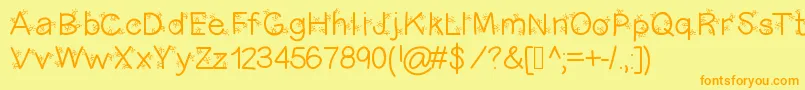 Christmasligtness Font – Orange Fonts on Yellow Background