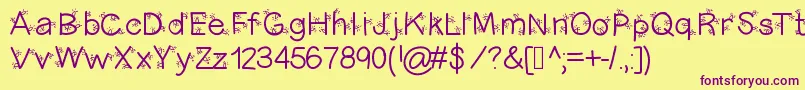 Christmasligtness Font – Purple Fonts on Yellow Background