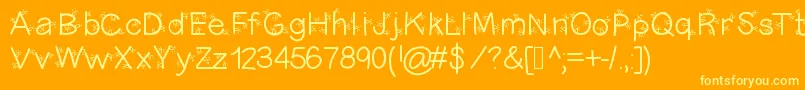 フォントChristmasligtness – オレンジの背景に黄色の文字