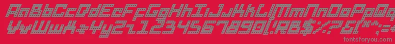 フォントDridi – 赤い背景に灰色の文字