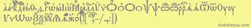 フォントTriodionIeucs – 黄色の背景に灰色の文字