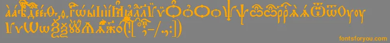 フォントTriodionIeucs – オレンジの文字は灰色の背景にあります。
