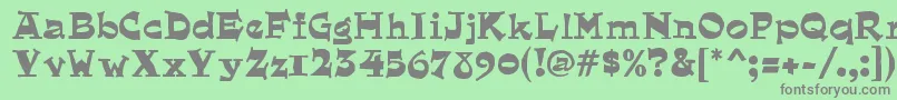 フォントQuaintRegular – 緑の背景に灰色の文字