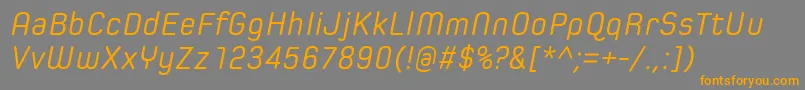 フォントSpoonRegularItalic – オレンジの文字は灰色の背景にあります。