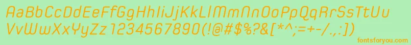 Czcionka SpoonRegularItalic – pomarańczowe czcionki na zielonym tle