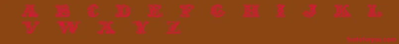 フォントExoticaMedium – 赤い文字が茶色の背景にあります。