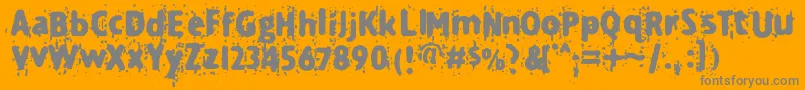 フォントTechnine – オレンジの背景に灰色の文字