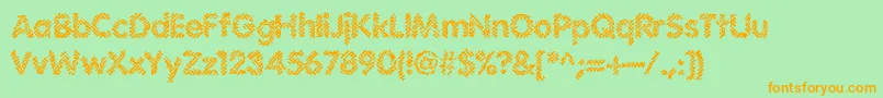 Irritate-Schriftart – Orangefarbene Schriften auf grünem Hintergrund