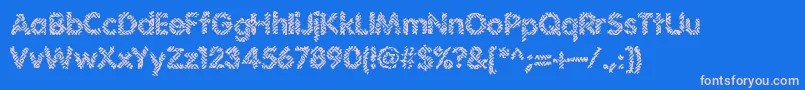 フォントIrritate – ピンクの文字、青い背景