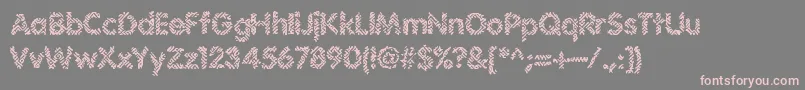 Irritate-Schriftart – Rosa Schriften auf grauem Hintergrund