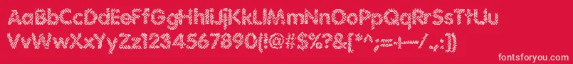 Irritate-Schriftart – Rosa Schriften auf rotem Hintergrund
