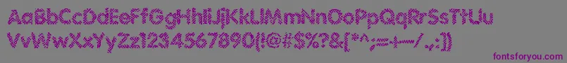 フォントIrritate – 紫色のフォント、灰色の背景