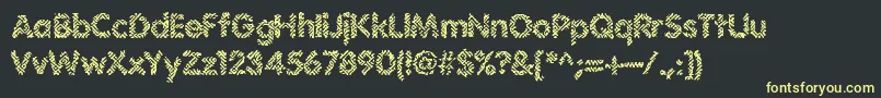 フォントIrritate – 黒い背景に黄色の文字