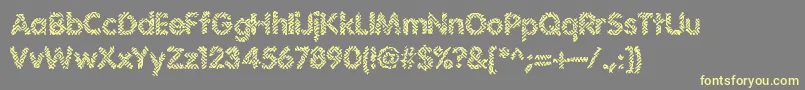 Шрифт Irritate – жёлтые шрифты на сером фоне