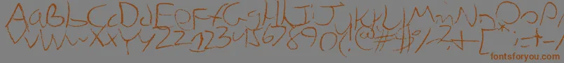 Chicken-Schriftart – Braune Schriften auf grauem Hintergrund