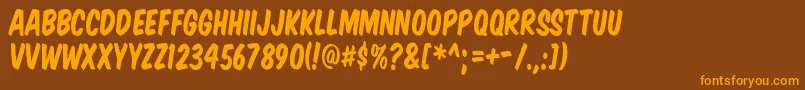 KomikaTitle-Schriftart – Orangefarbene Schriften auf braunem Hintergrund